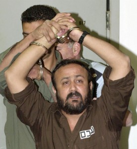 LEADER OF THE PALESTINIAN UPRISING MARWAN BARGHOUTI ENTERS INTO A TEL AVIV COURTROOM.